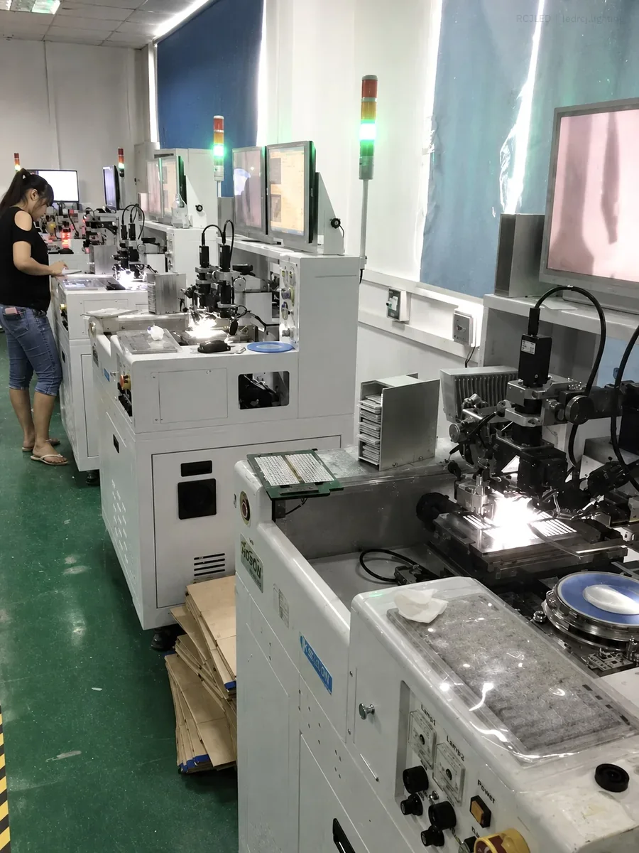 RCJLED operators and equipment on the automotive lighting production floor